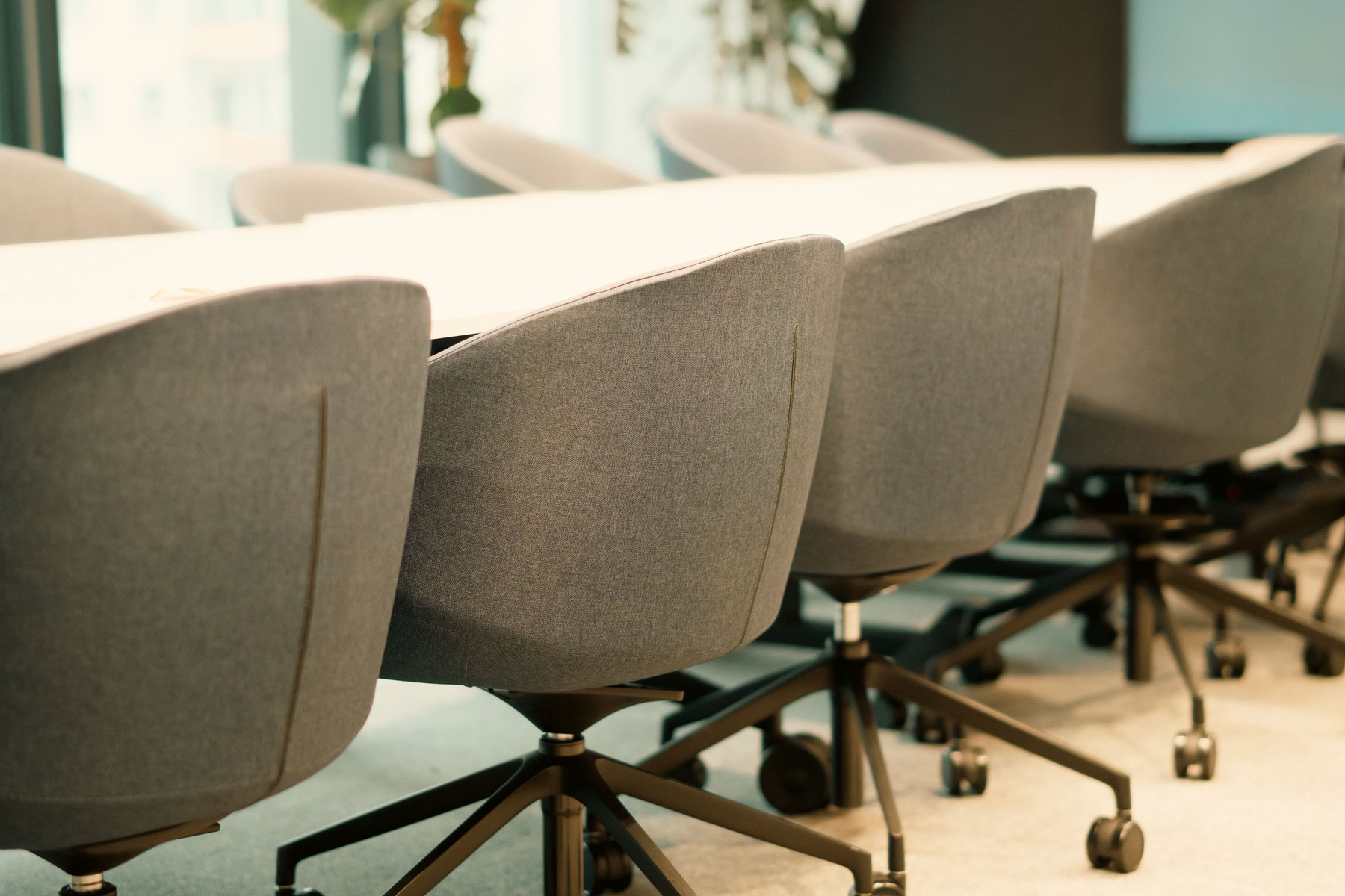Empty conference room prepared for an ESG consulting or managed-service meeting