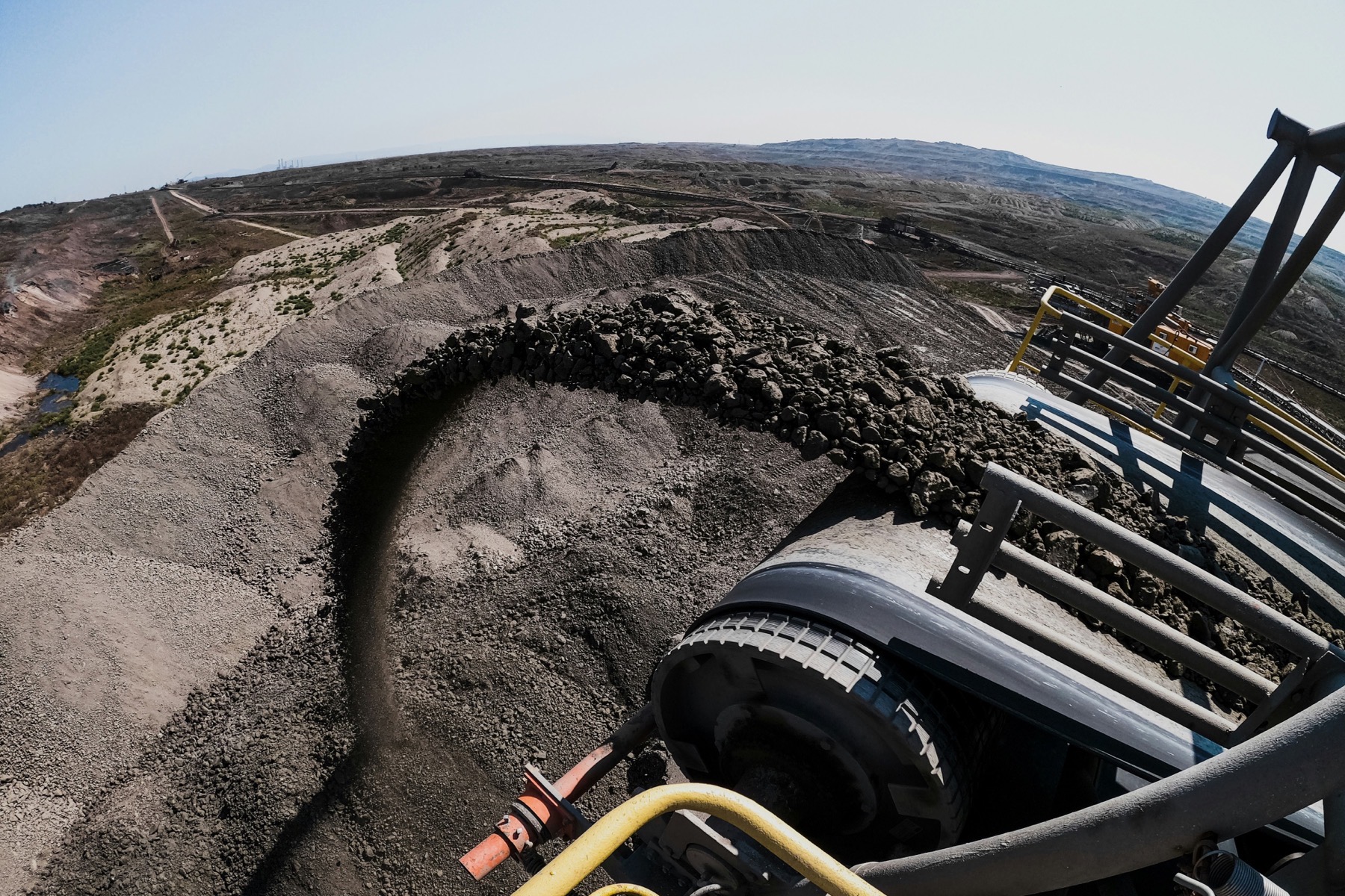 Open-pit mineral operation representing rare-earth supply-chain exposure