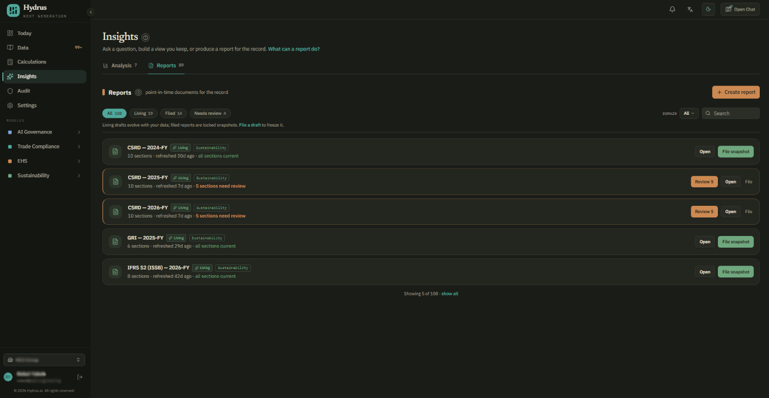 Reports tab with the create report button, filters, counts, and living drafts that need review.
